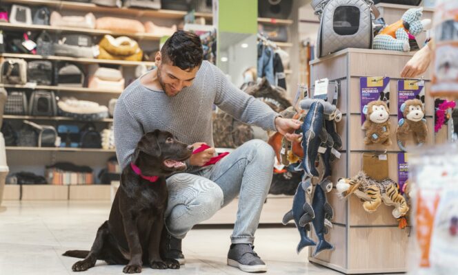 dog with owner in petshop
